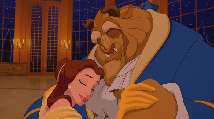 The Beast and Belle hugging on the dance floor