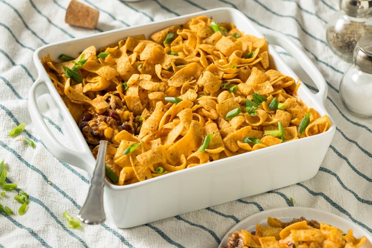 Shutterstock: Homemade Frito PIe Mexican Casserole with Cheese and Beans