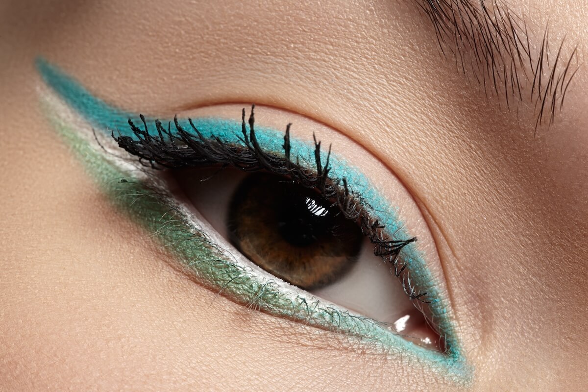 Shutterstock: Elegance close-up of beautiful female eye with fashion trend mint colors eyeshadow and eyeliner. Macro shot of beautiful woman's face part with makeup. Cosmetics, beauty and make-up