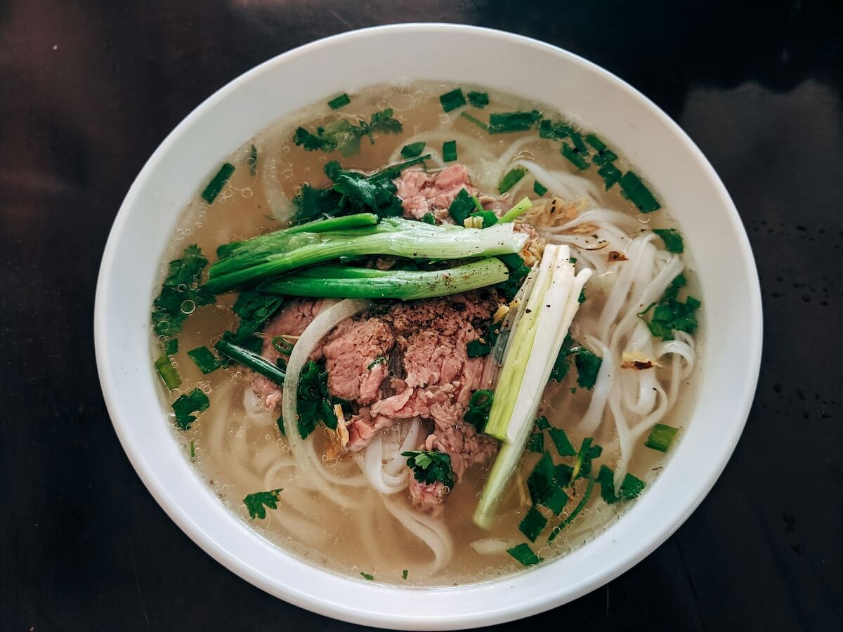 Unsplash: Bowl of beef pho by Markus Winkler