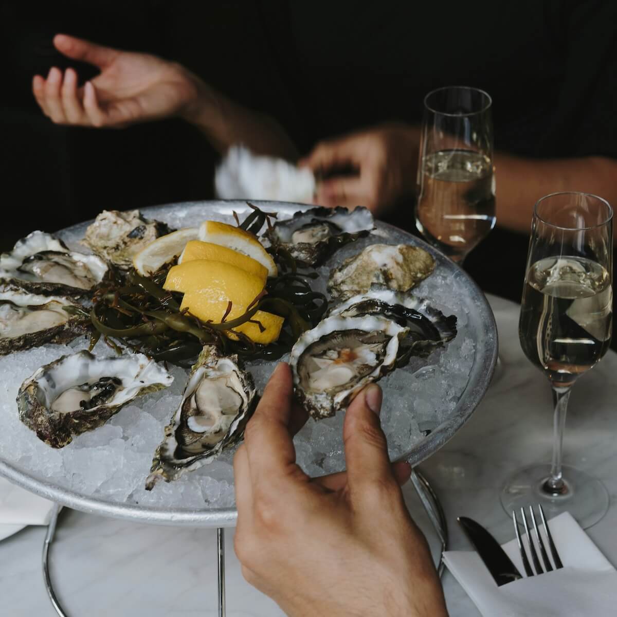 Unsplash: Plate of oysters by Cathrine Skovly