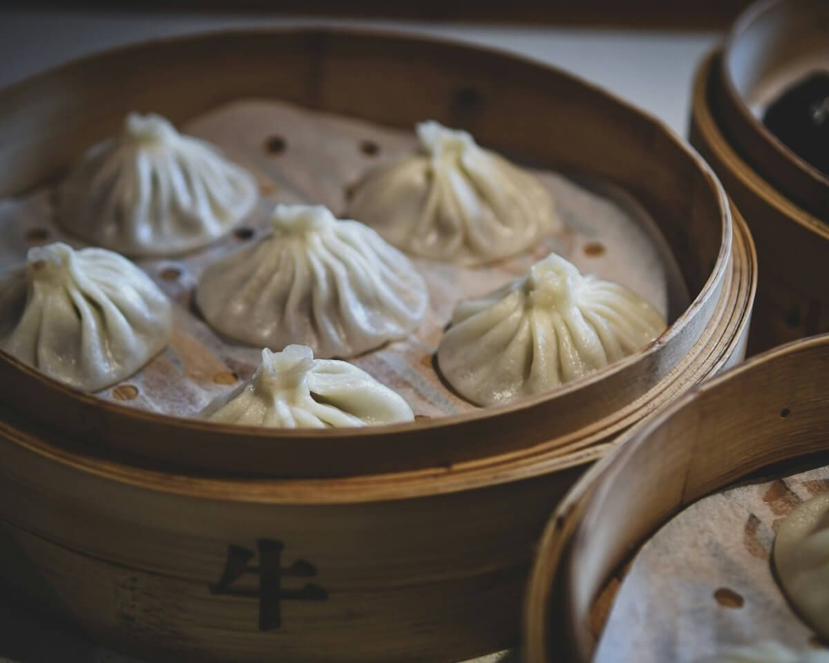 Unsplash: Steamer full of dim sum by bao menglong