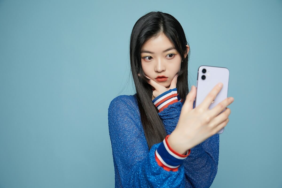 Unsplash: Woman taking fun selfie by dynamic wang