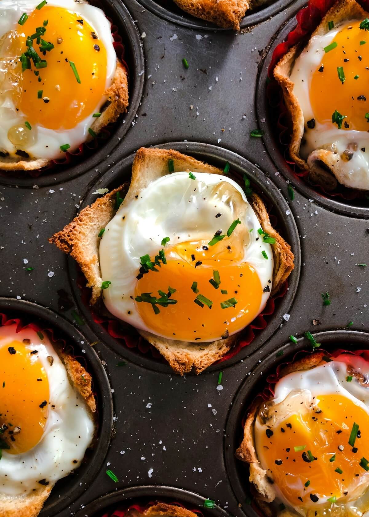 Unsplash: baked eggs in tins by Christian Coquet
