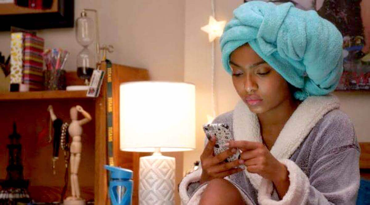 Grown-ish: Zoey texting while wearing a towel turban