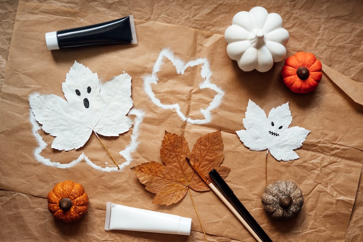 Shutterstock: Halloween ghosts from dry maple leaves. Halloween natural DIY decor. Kids art project. Sustainable Eco-Friendly Halloween holiday decoration
