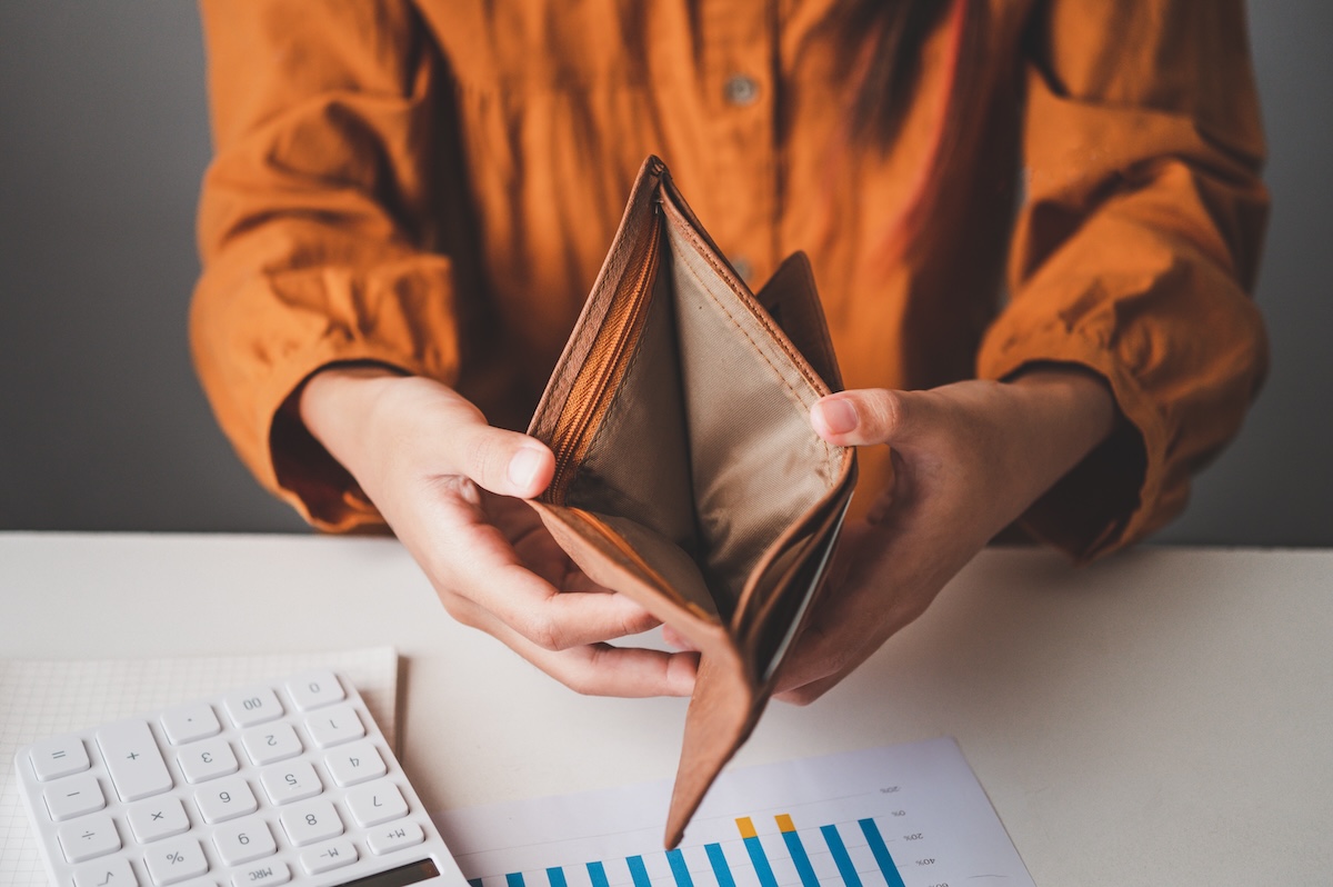 Shutterstock: Empty money in wallet, concept money deficit, money is not enough , Unemployment, poverty