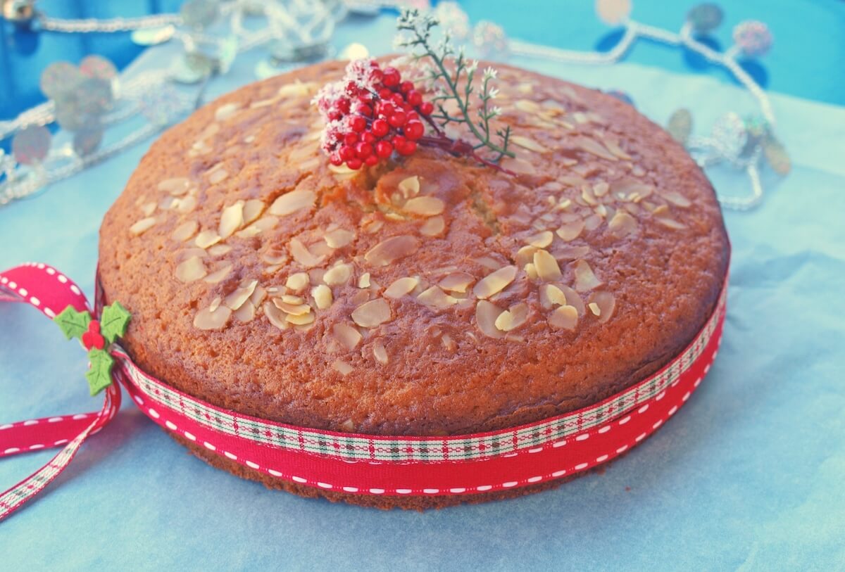Shutterstock: Homemade Greek Vasilopita decorated with almond slivers and ribbons
