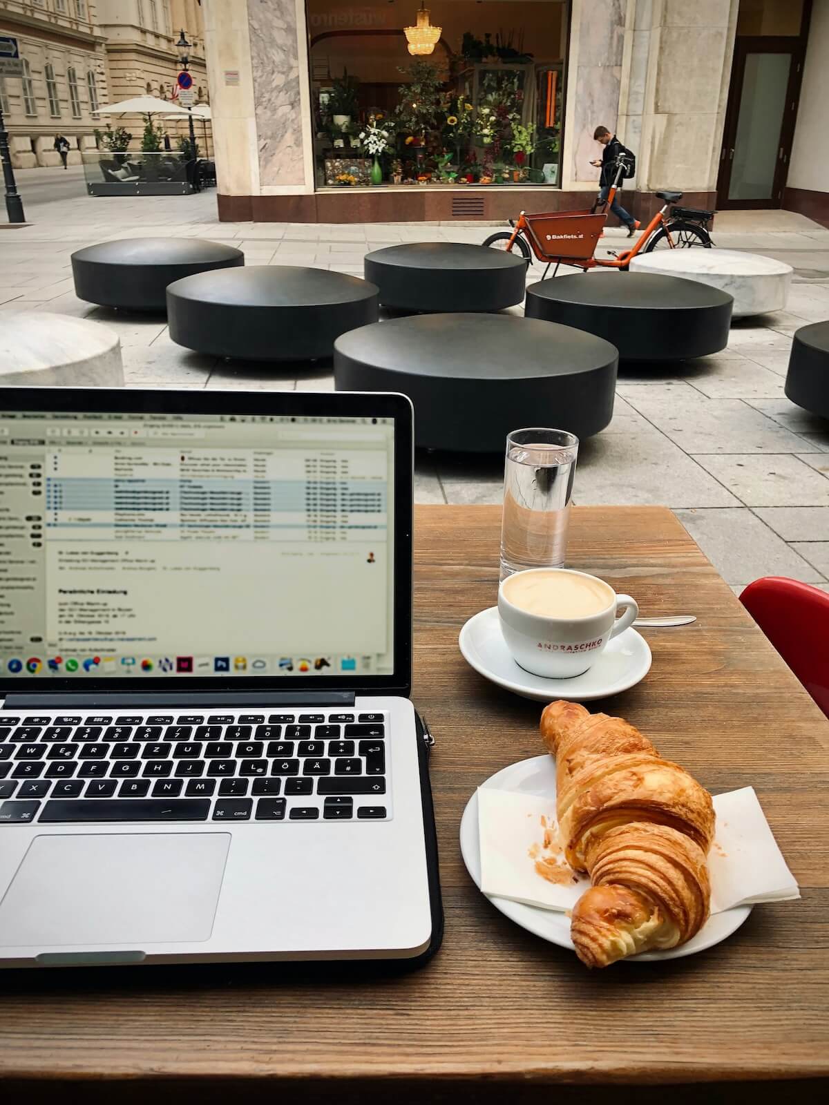 Unsplash: Working with croissant on table by Arno Senoner