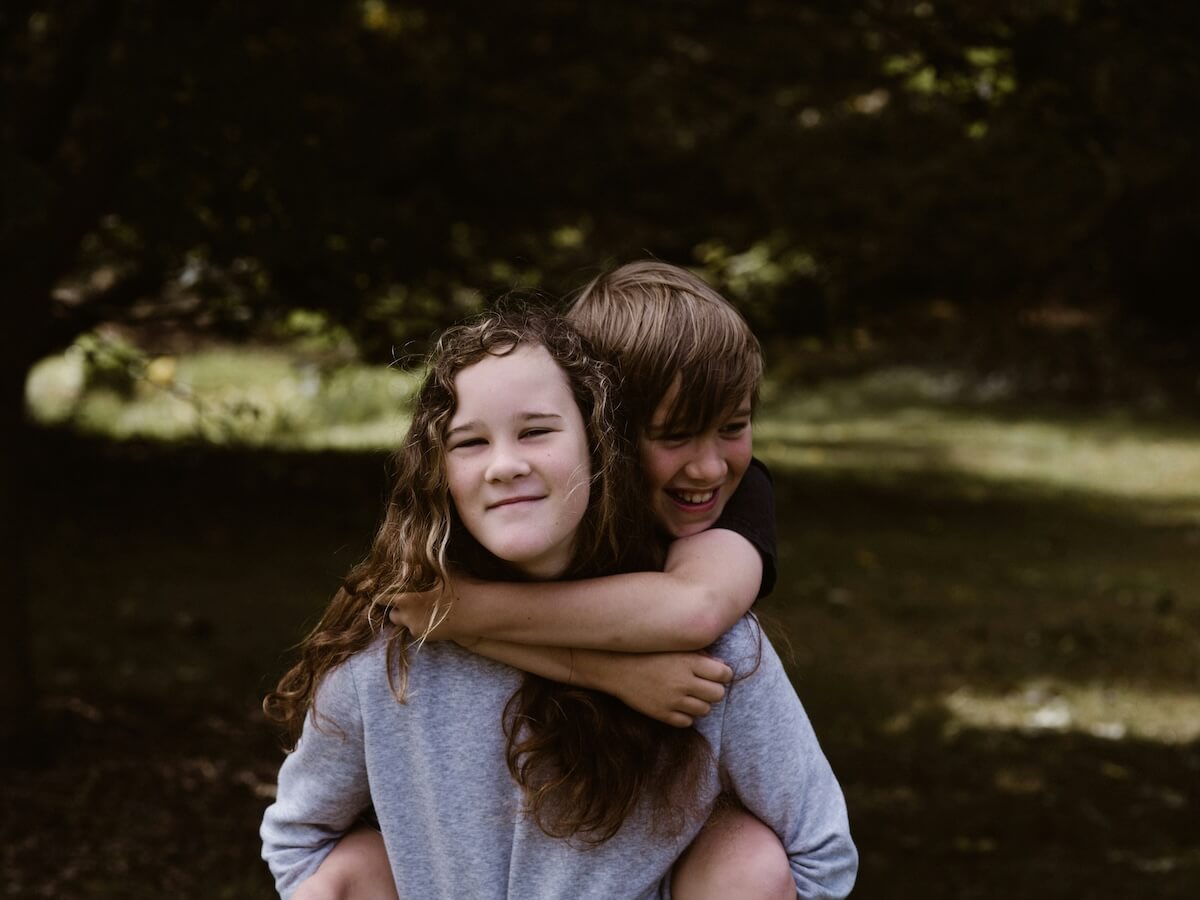 Unsplash: Big sister and little brother by Annie Spratt