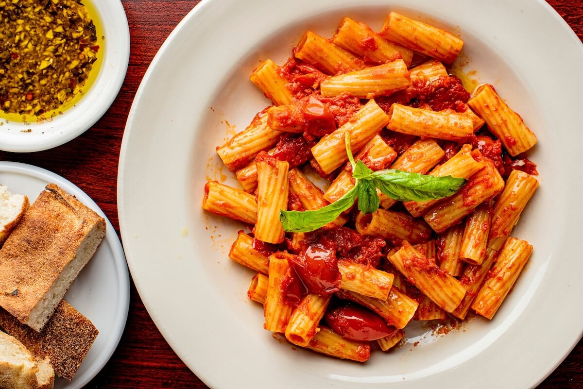 Shutterstock: Rigatoni and Meatballs. Pasta. Classic traditional Italian restaurant favorite. Rigatoni pasta and beef meatballs covered in fresh tomato marinara sauce and garnished with fresh Italian parsley.