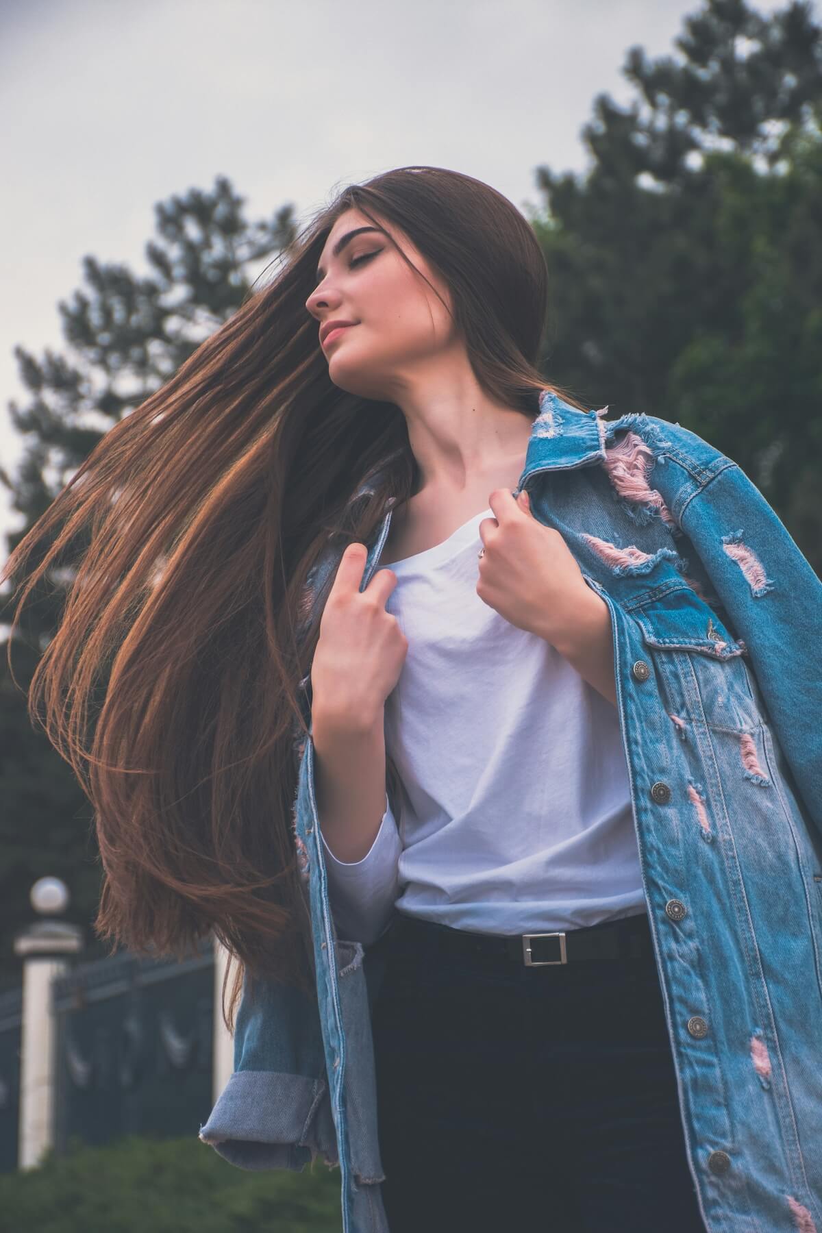 Unsplash: Woman with long hair and denim jacket by Valerie Elash