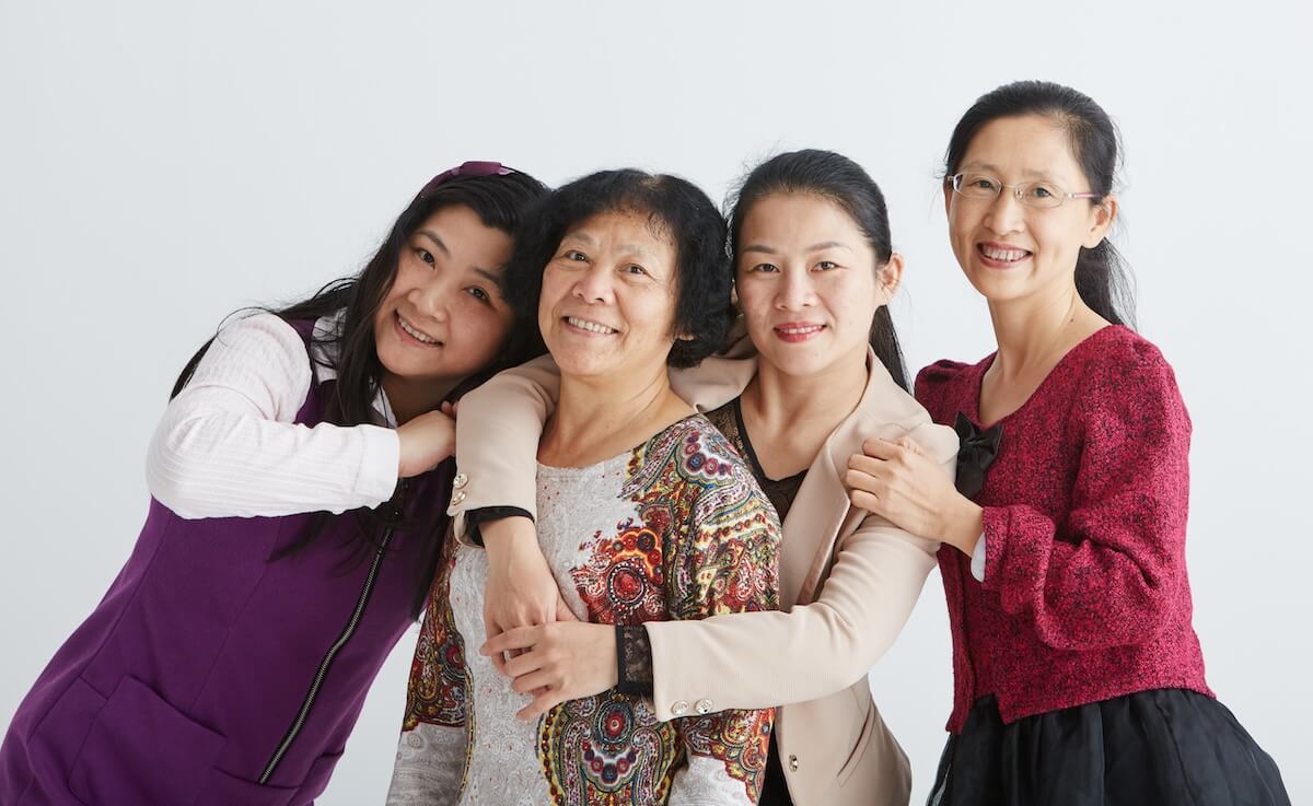 Shutterstock: Asian family character. shot in studio white background