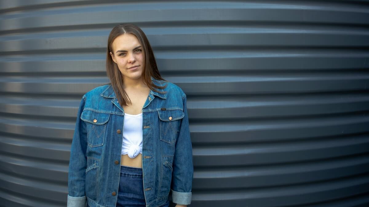 Unsplash: Woman in denim jacket and pants by Brad O Reilly