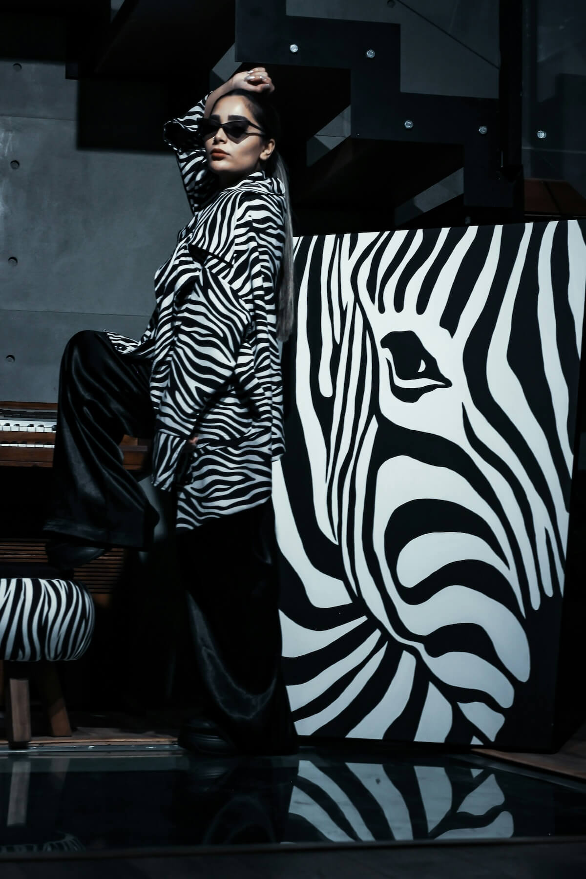 Unsplash: Woman wearing zebra print coat by Alireza Fashion