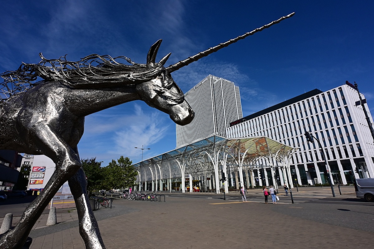 Shutterstock: Lodz, Poland, Europe - 08.11.2024 : 'Unicorn; a place for stars' steel sculpture by Tomohiro Inaba, central tram station called Unicorn stable, Hotel Hampton by Hilton and Kompleks Hi Piotrkowska