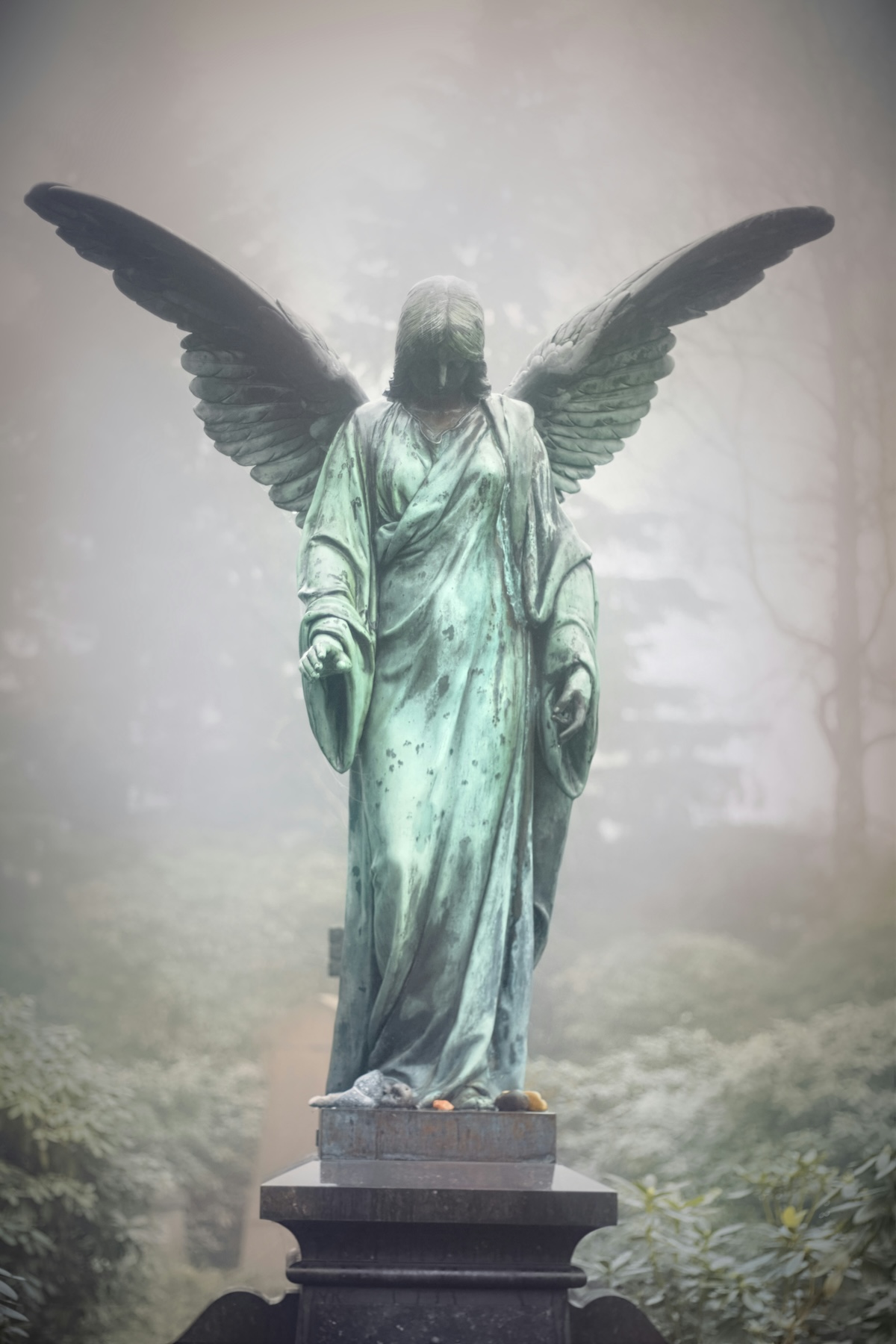 Unsplash: Angel statue by marek studzinski