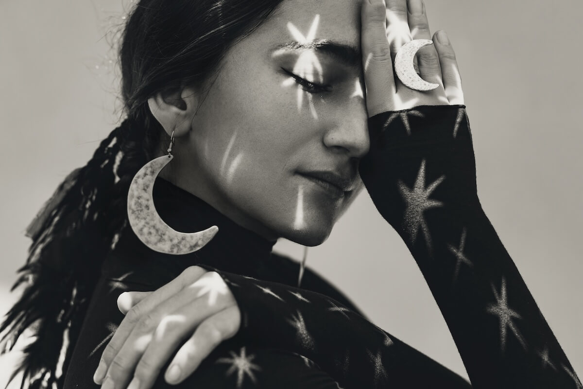 Shutterstock: beautiful young woman with stylish jewelry. night dream concept