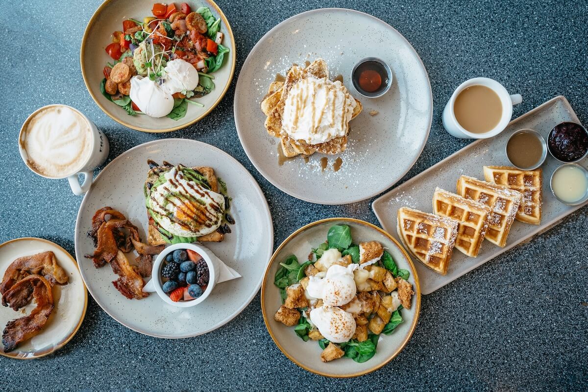 Unsplash: Brunch spread with sweet and savory foods by Davey Gravey