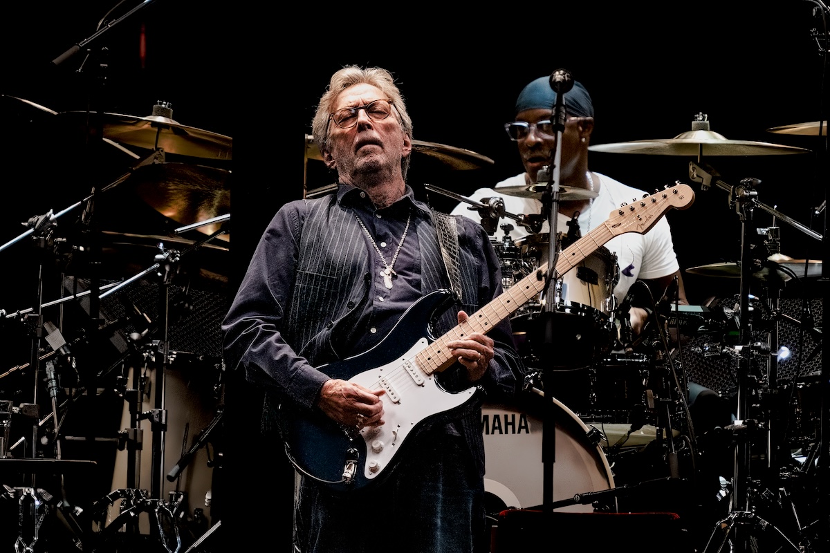 Shutterstock: Detroit, Michigan -USA- September 10, 2022: Eric Clapton performs with special guest Jimmie Vaughan at the Little Caesar's Arena