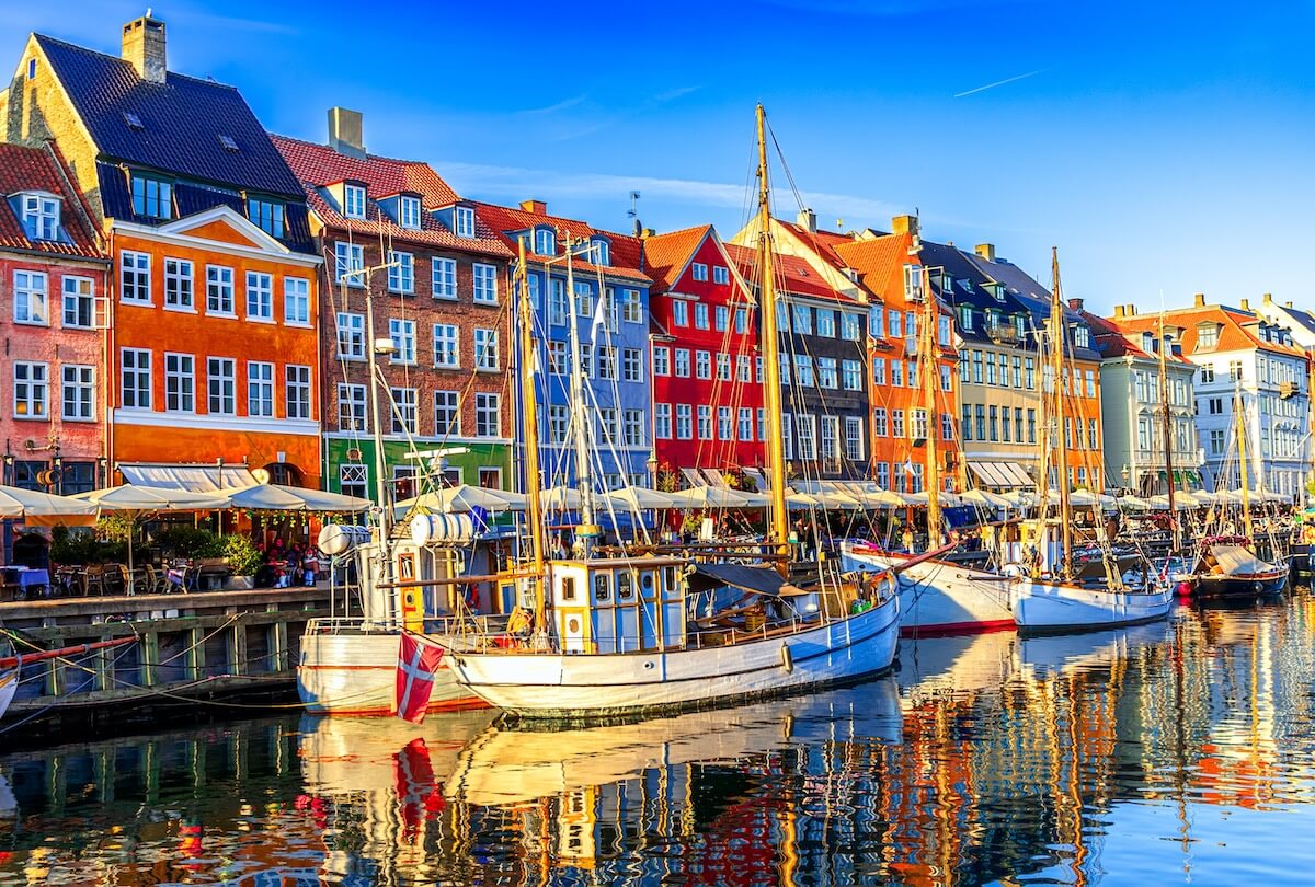 Shutterstock: Copenhagen, Denmark: Old Nyhavn harbour with ships and colorful buildings, Old Town, Europe travel destination