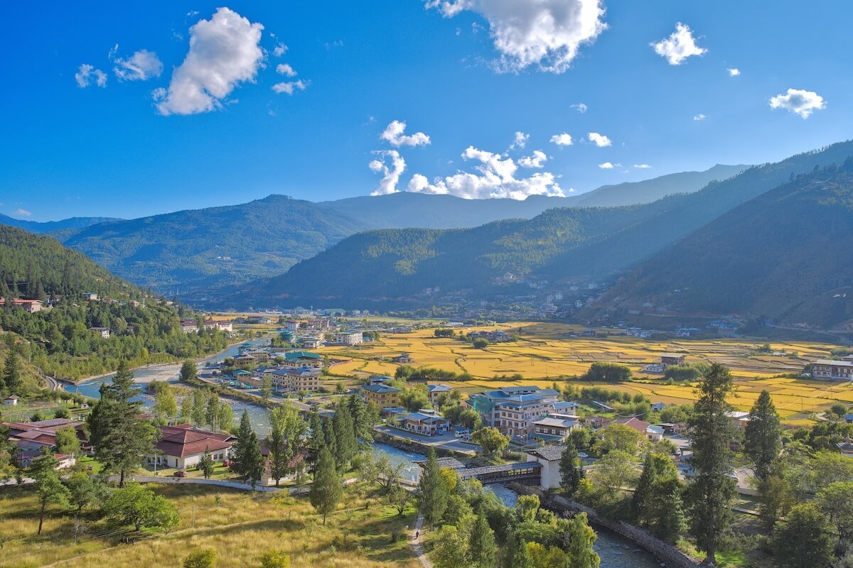 Shutterstock: Landscape overlooking Paro City in Bhutan together with the surrounding golden rice fields during later afternoon. Taken during October or the autumn season.