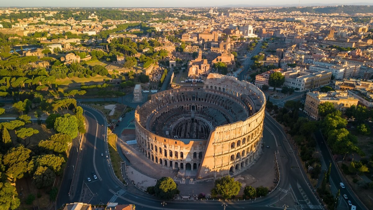Shutterstock: An aerial view of the historic Colosseum and surrounding buildings in Rome, Italy