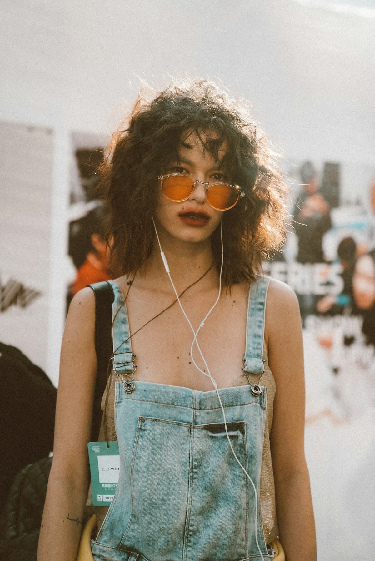 Unsplash: Woman with curly shaggy hair but Yiran Ding