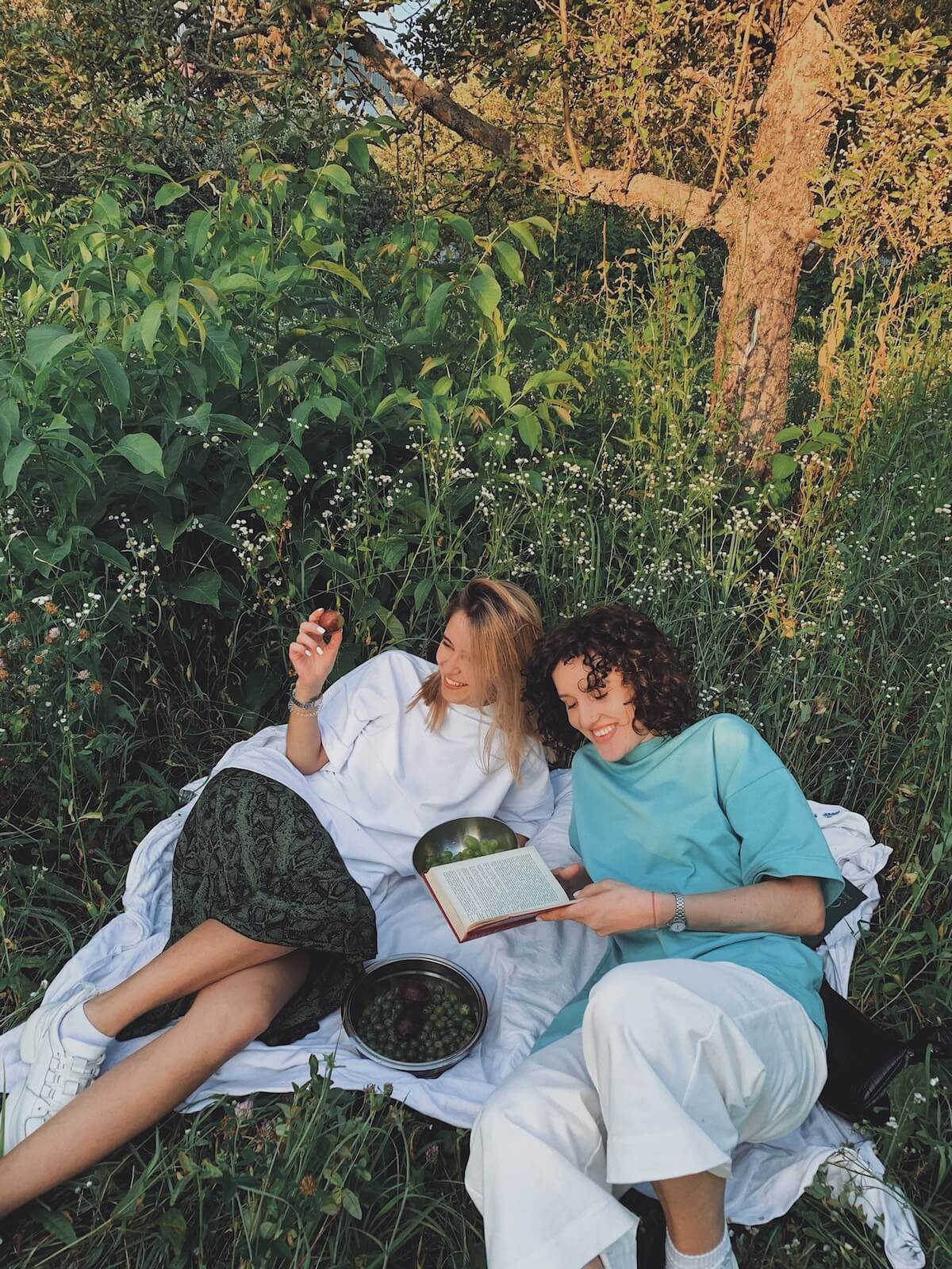 Unsplash Women hanging out having picnic and reading Anastasiia Rozumna