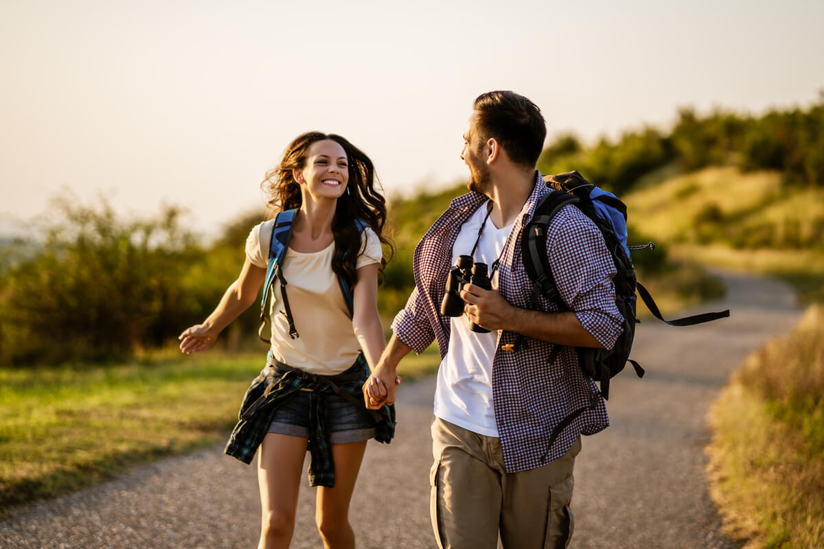 couple having fun while hiking