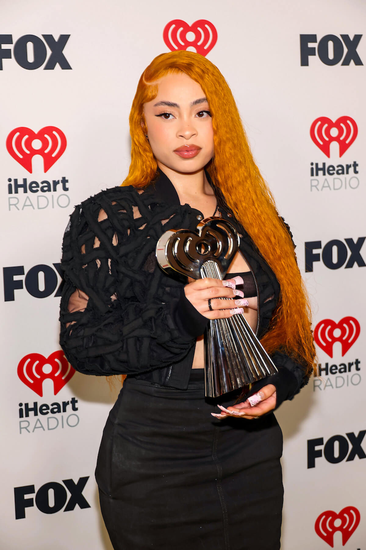 LOS ANGELES, CALIFORNIA - APRIL 01: (FOR EDITORIAL USE ONLY) Ice Spice, winner of the Best New Hip-Hop Artist award, attends the 2024 iHeartRadio Music Awards at Dolby Theatre in Los Angeles, California on April 01, 2024. Broadcasted live on FOX. (Photo by Jesse Grant/Getty Images for iHeartRadio)