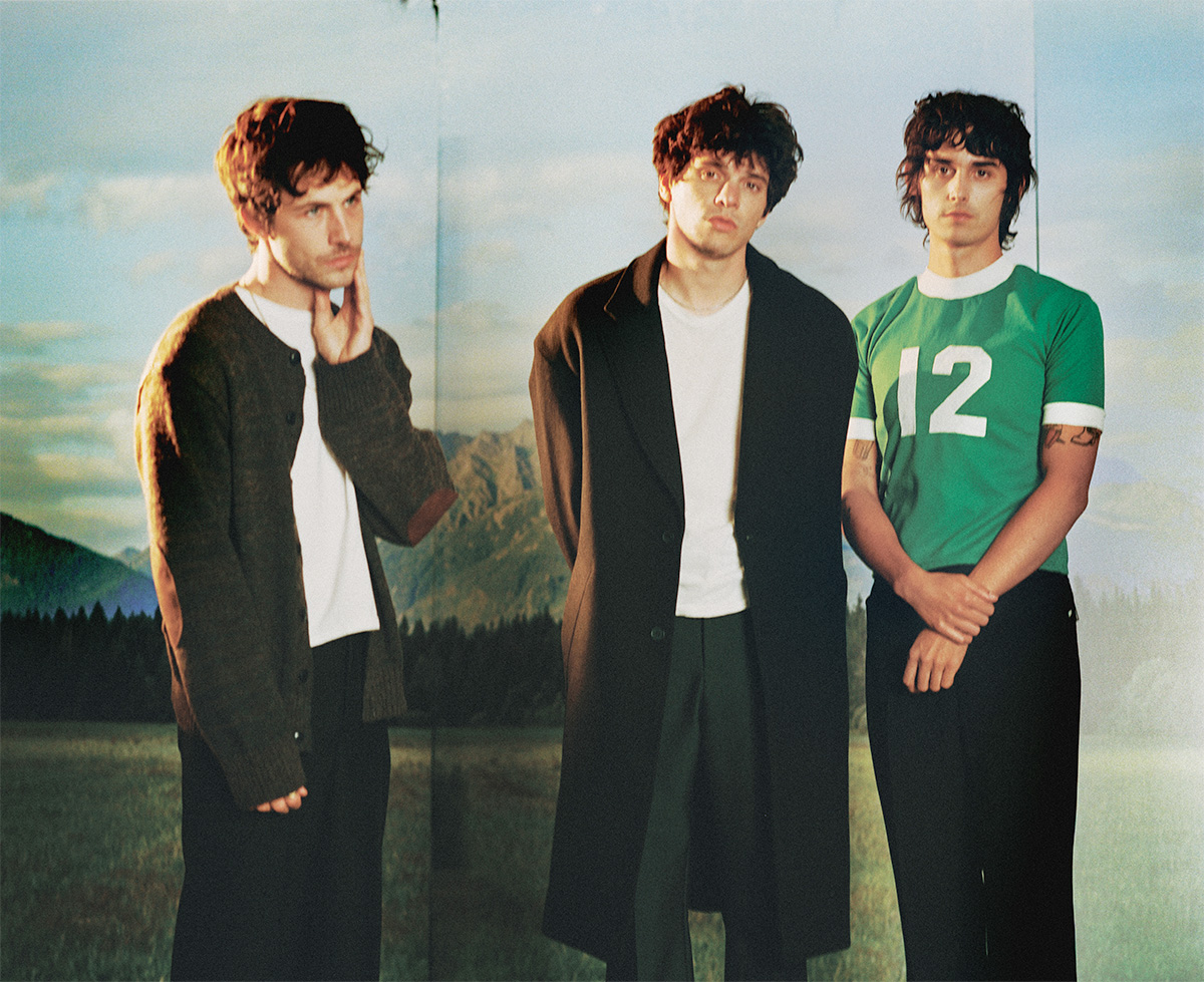 Wallows press photo against mountain backdrop