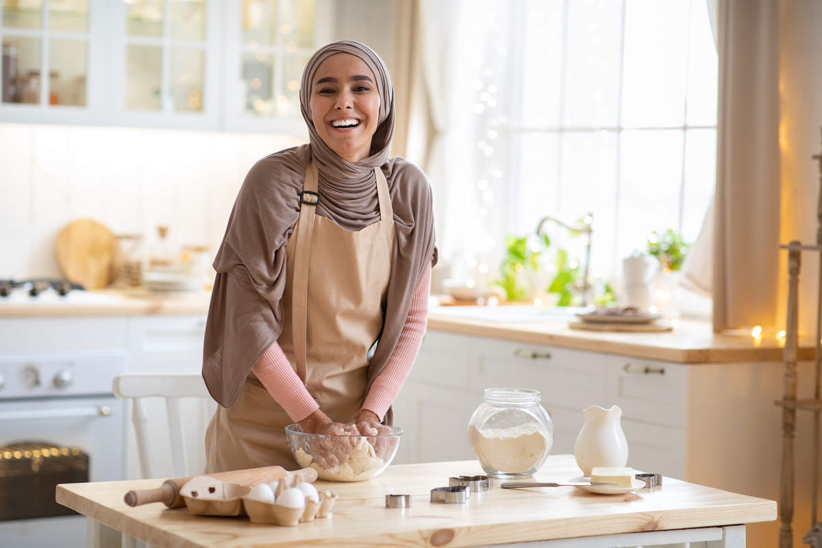 woman wearing hijab baking