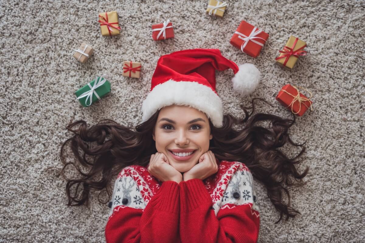 girl wearing a santa claus hat