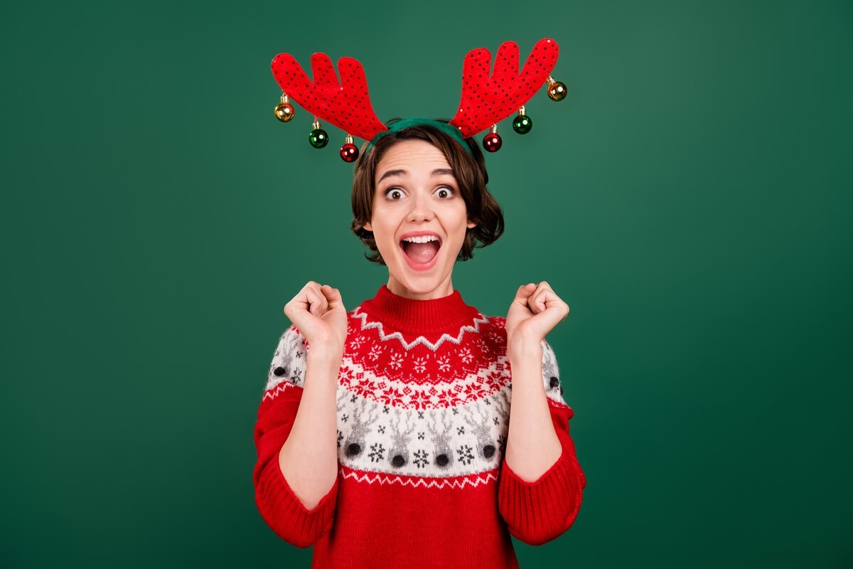 young woman wearing reindeer ears