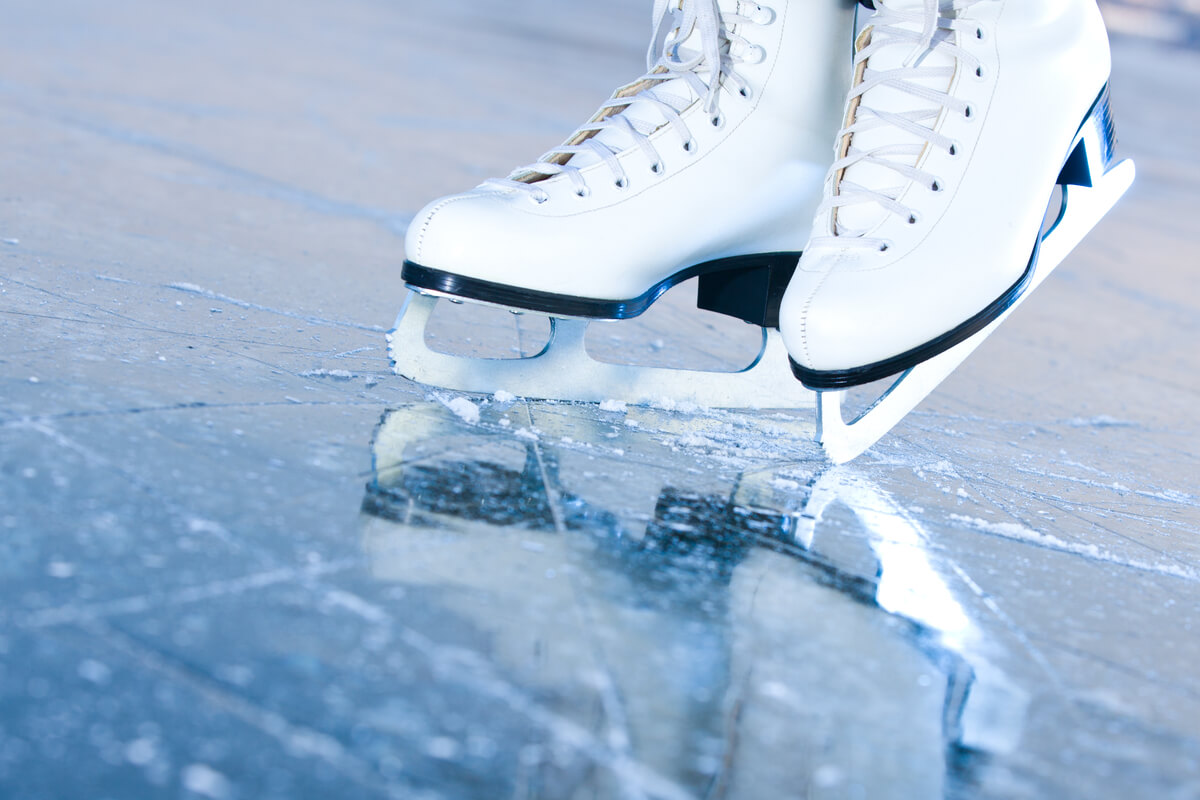figure skates on shiny ice