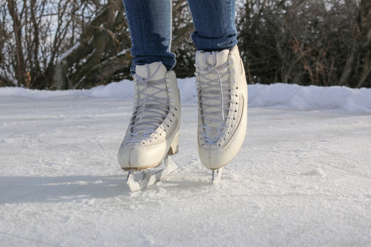 person wearing edea ice fly skates