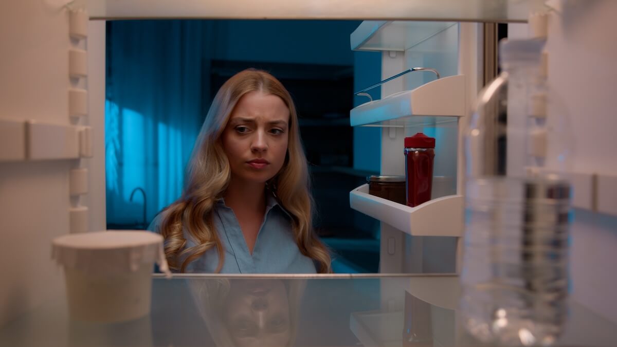 Shutterstock: Point of view POV inside refrigerator Caucasian girl hungry woman open fridge at home kitchen look at empty shelves order food products delivery with mobile phone app online service web store shopping