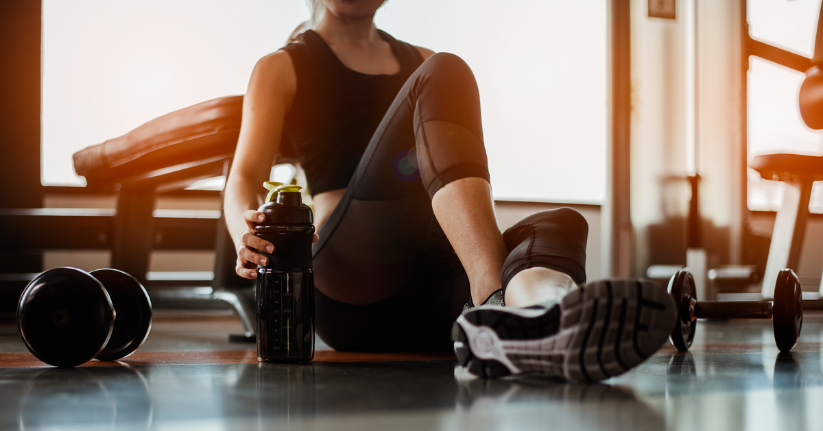 woman with gym water bottle