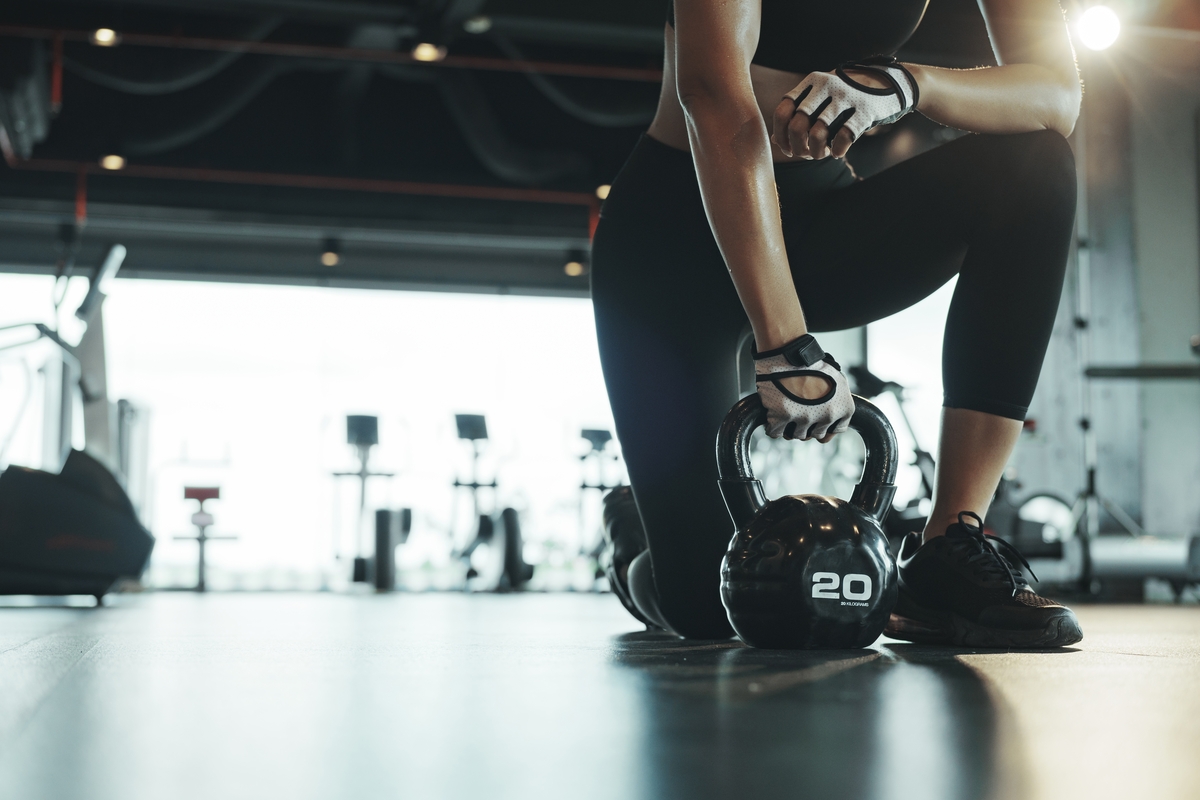 woman with gym weights