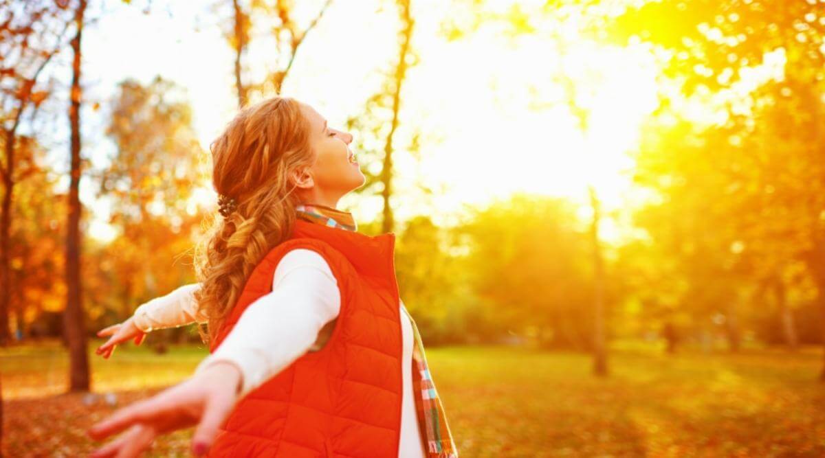 carefree female in the fall