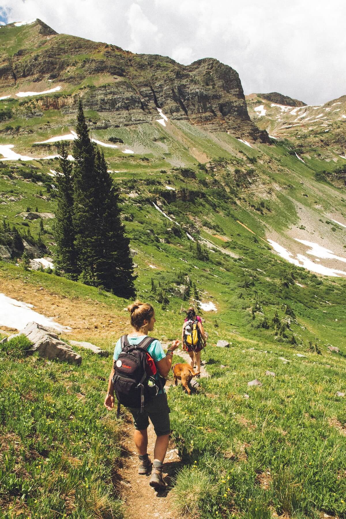 Unsplash: Couple on nature hike by Holly Mandarich