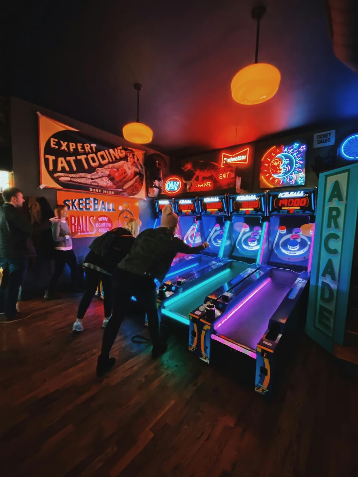 Unsplash: Friends playing skee ball at arcade by Taylor Friehl