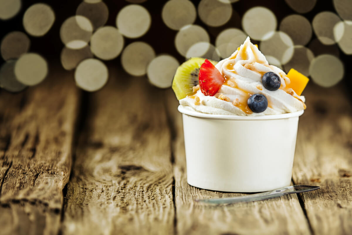 white froyo with fruit and caramel