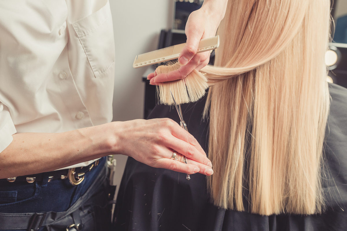 woman getting a hair cut