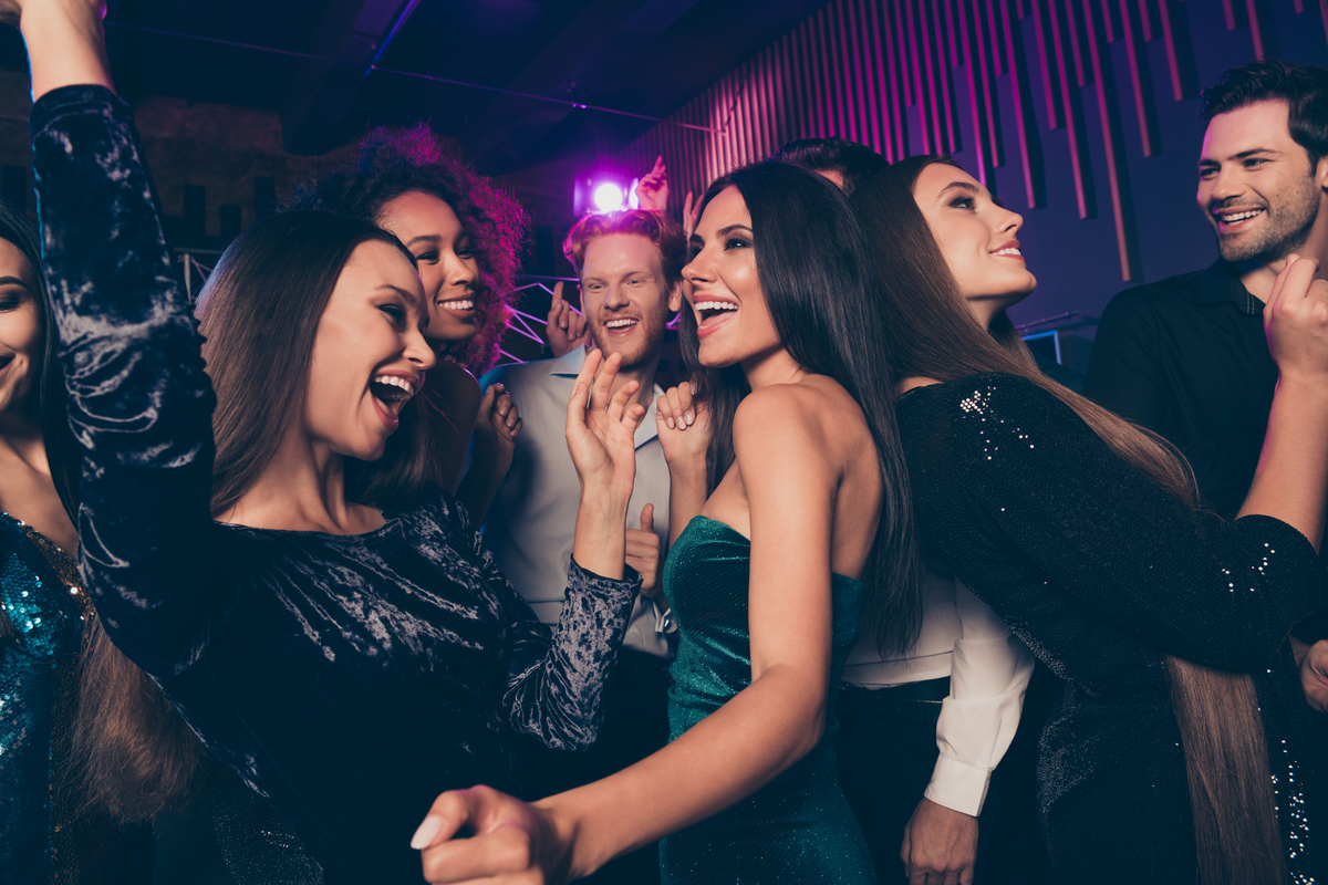 group of girls dancing at prom