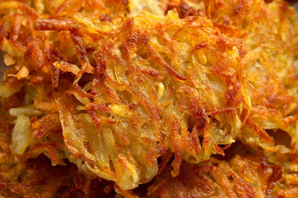 Shutterstock: Potato rosti or hash brown close up, background