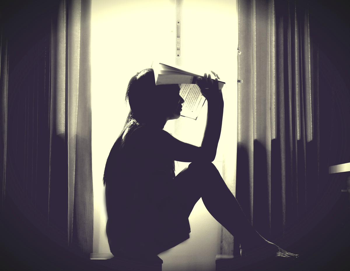 stressed person with book