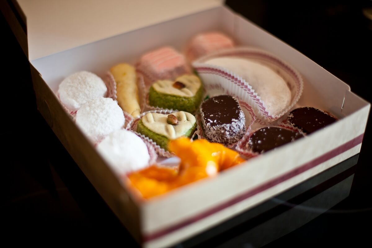 Unsplash: Box of beautiful desserts by REno Laithienne