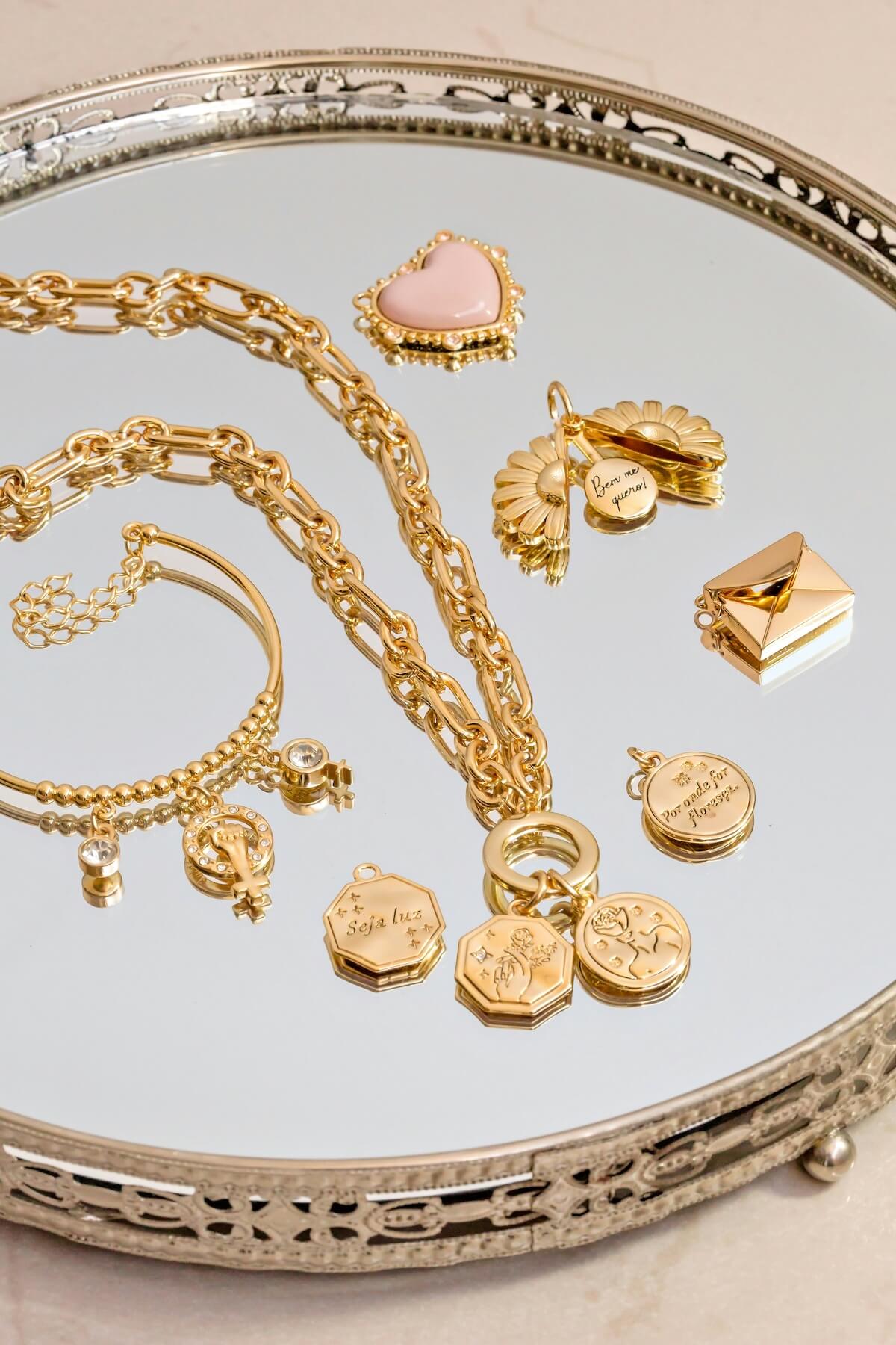 Unsplash: Collection of gold jewelry by Ruan Richard Rodrigues